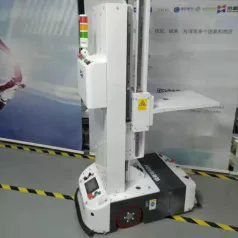 Automatic charging, low-profile lifting, stacking, palletizing, and assembling of cartons, boxes, and frames - AGV 
